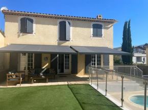 Belle villa avec jardin et piscine au calme
